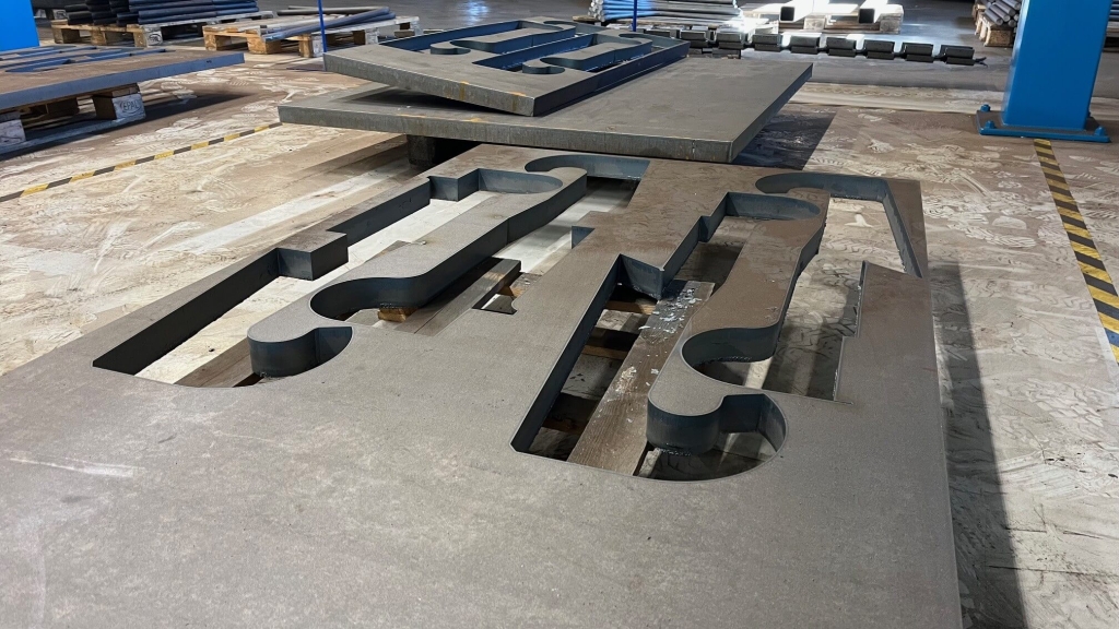 Laserutskuret material